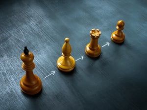 Line-of-chess-pieces-and-arrows-as-a-concept-of-succession-planning